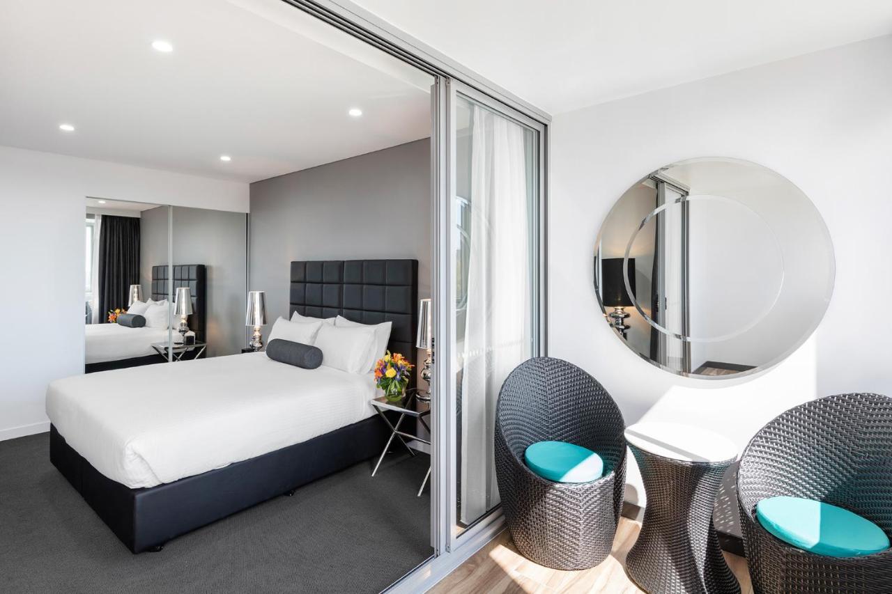 Bedroom with a mirror on the ceiling ;) - Picture of Meriton